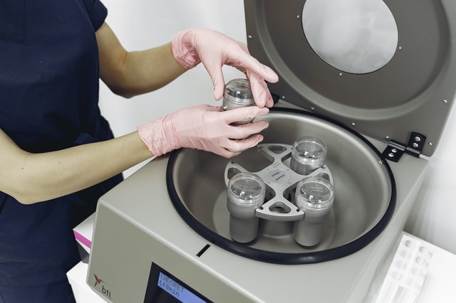Putting the samples in a centrifuge